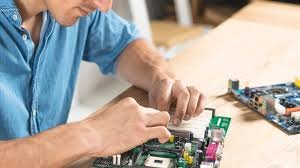 Embedded software developer working on circuit board